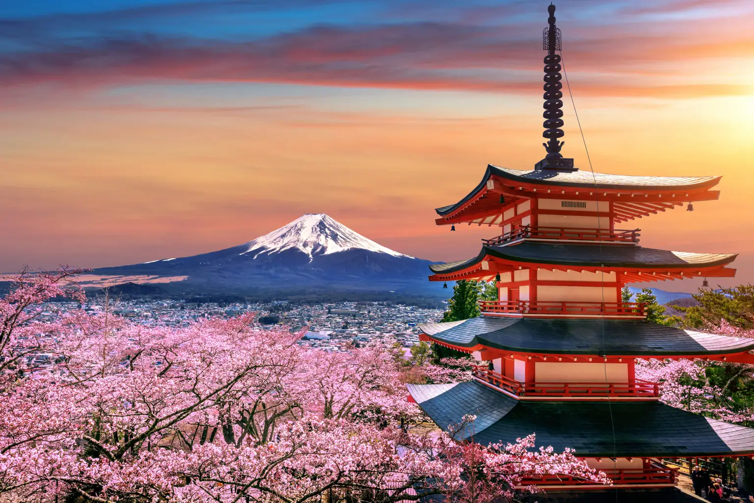 Chureito Pagoda with cherry blossoms and Mount Fuji at sunset, Japan